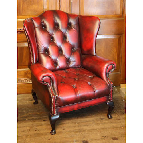 Oxblood leather wing chair.jpg